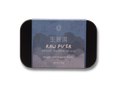 Tin of Raw Pu'er instant tea resin with blue label on a white background
